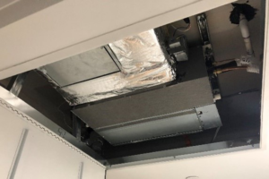 Heat pump in a ceiling cavity