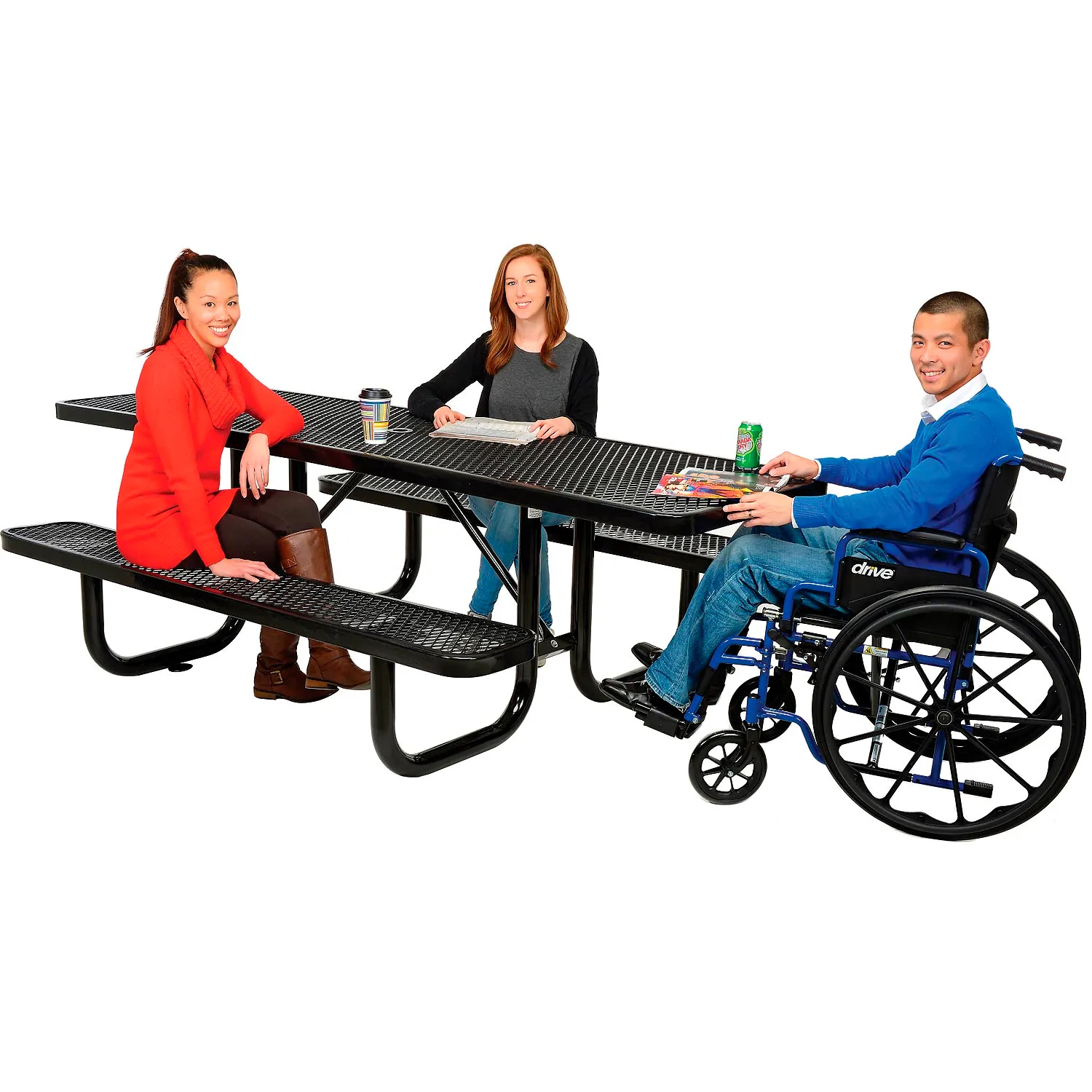 Three people using an accessible picnic table, one of which is in a wheelchair