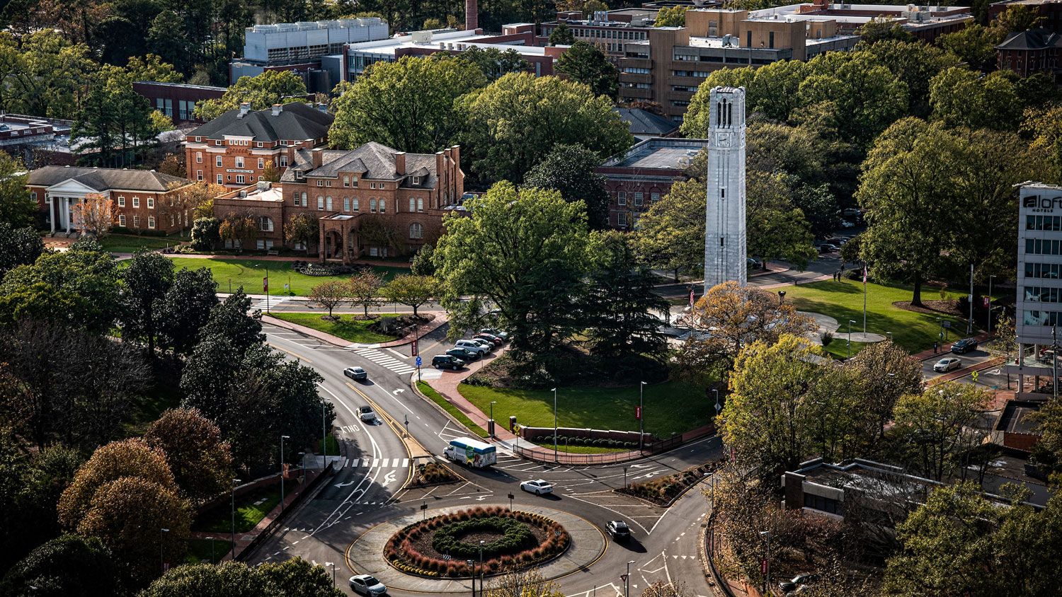 Aerial view of North Carolina State University campus with belltower