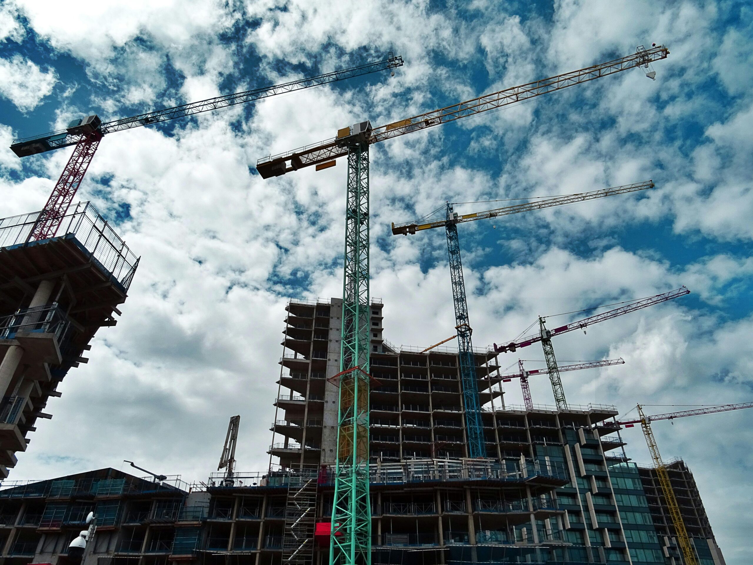 cranes working on a building